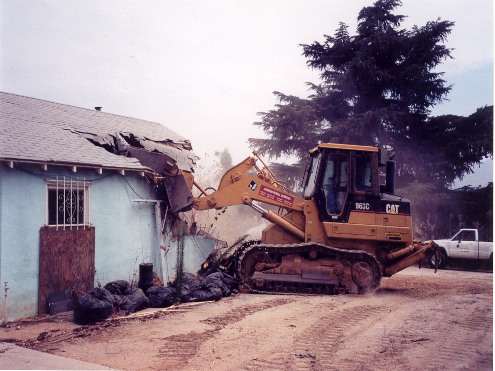 House demolition front end loader